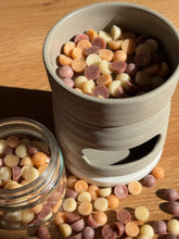 Load image into Gallery viewer, Ceramic container filled with colorful candy pieces on a wooden surface