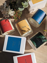 Load image into Gallery viewer, Flat lay photo of colourful floral candles