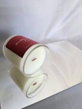 Load image into Gallery viewer, Wooden wick soy candle lying on a mirror.