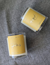 Load image into Gallery viewer, Two candles in glass jars, with yellow labels titled &#39;Positivity&#39;.

