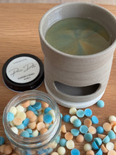 Load image into Gallery viewer, Ceramic mug with green liquid, jar of colorful candies, and Lussentc branding on a wooden surface.
