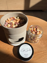 Load image into Gallery viewer, Two containers of colorful candies on a wooden surface with a 'Luscentic' label.
